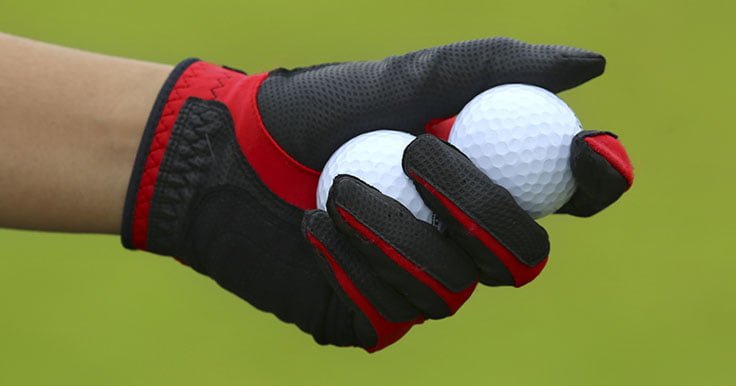 Wearing a golf glove